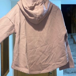Asymmetrical hem, cropped hoodie with bell sleeves, light pink
